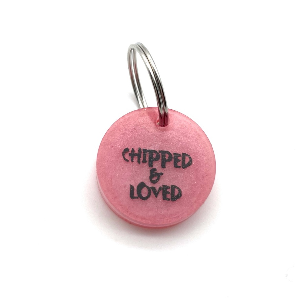 “Chipped & Loved” tag for pet collar